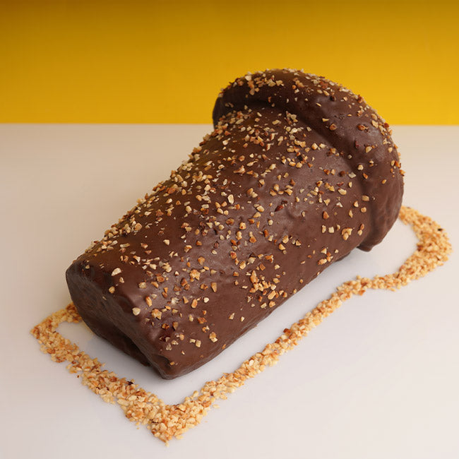 Natu Babbà with dark chocolate and hazelnuts